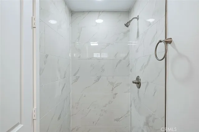a view of hallway with wooden floor