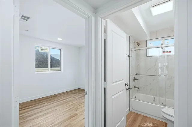 an aerial view of a house with a yard and a fountain