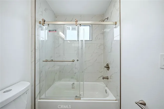 a view of a house with a street