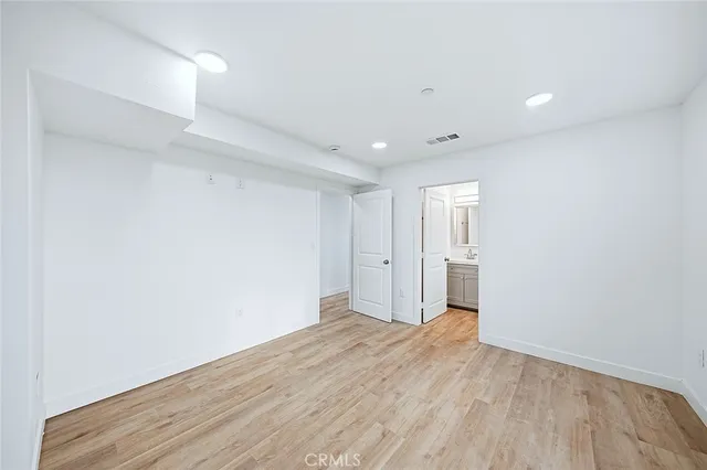 a kitchen with granite countertop a stove and a microwave