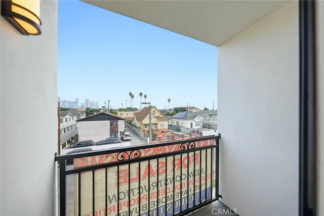 a bathroom with a bathtub shower sink vanity and toilet