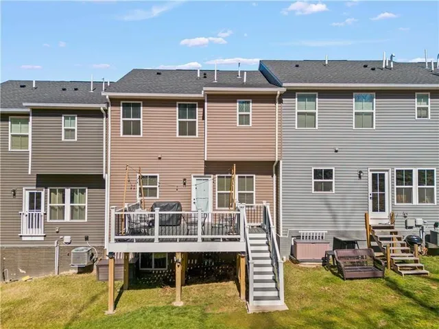 a view of house with outdoor seating space
