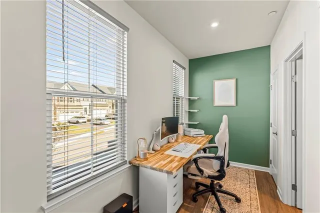 a workspace with furniture and a window