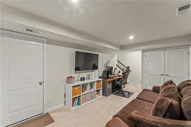 a view of a livingroom with furniture and