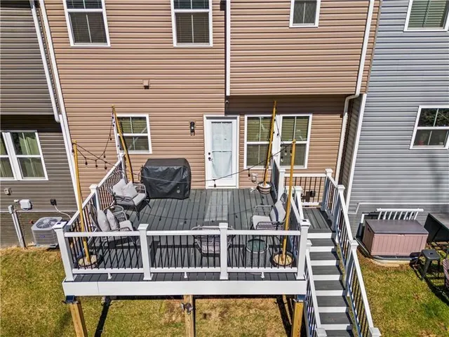 a front view of a house with a deck