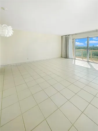 an empty room with a fireplace