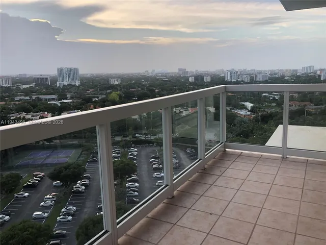 a view of a balcony with an outdoor space