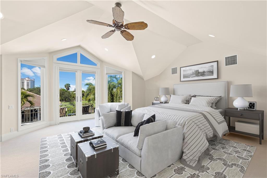 6963 Verde Way Naples, FL 34108 - Photo 22 of 31 a bed room with bed and a large window