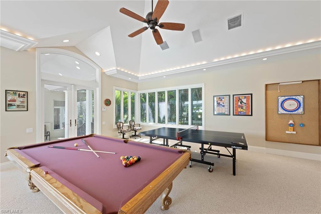 6963 Verde Way Naples, FL 34108 - Photo 26 of 31 a living room with furniture pool table and a window