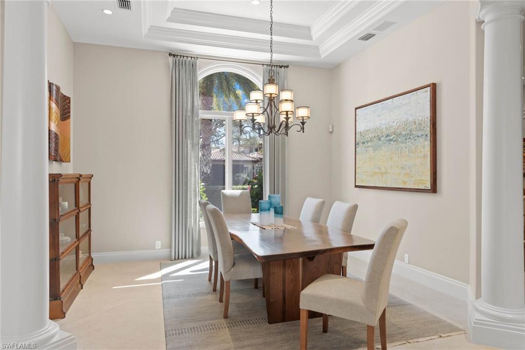 6963 Verde Way Naples, FL 34108 - Photo 8 of 31 a dining room with furniture and window