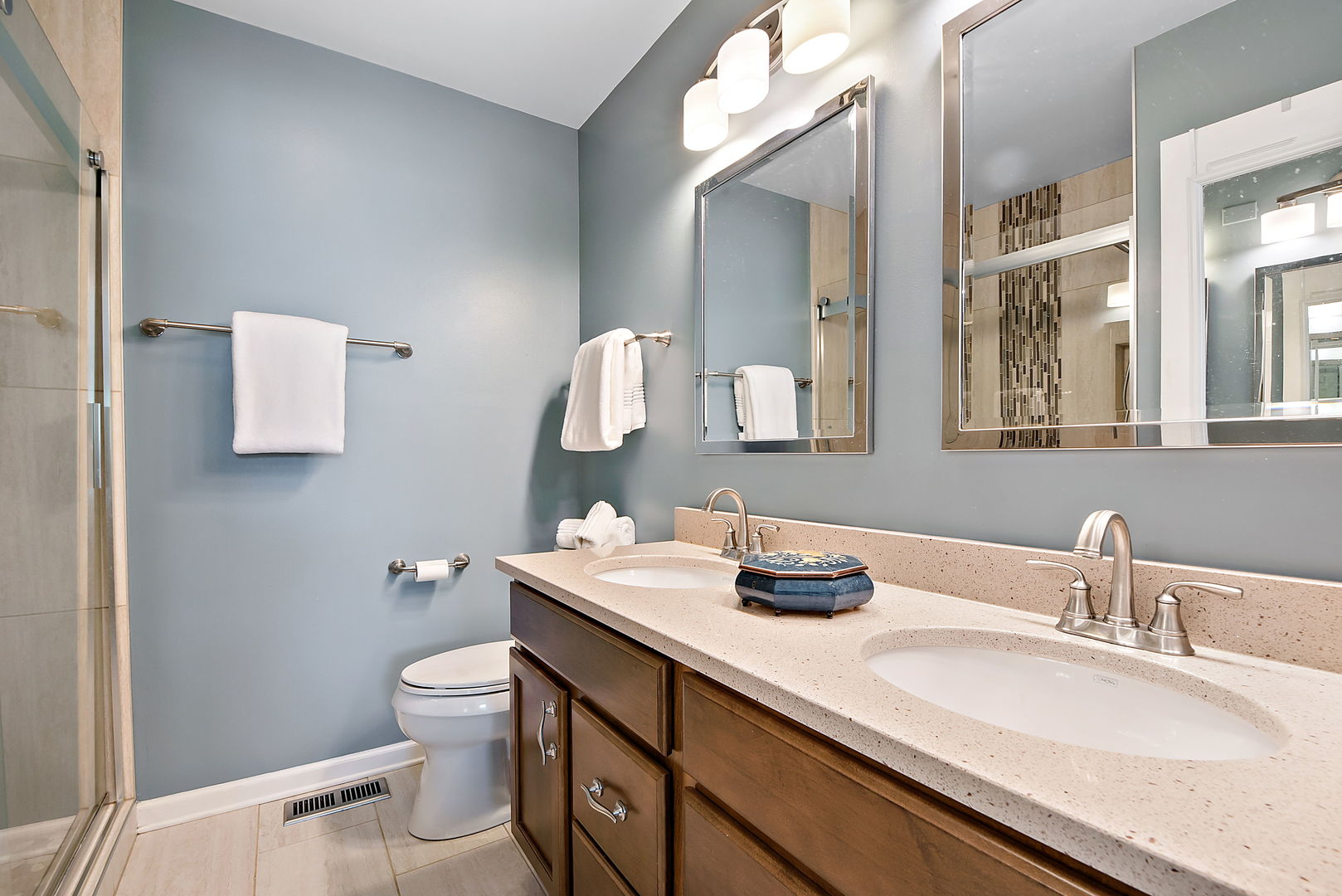 1061 Stillwater Road Elgin, IL 60120 - Photo 18 of 20 a bathroom with a granite countertop sink mirror and toilet