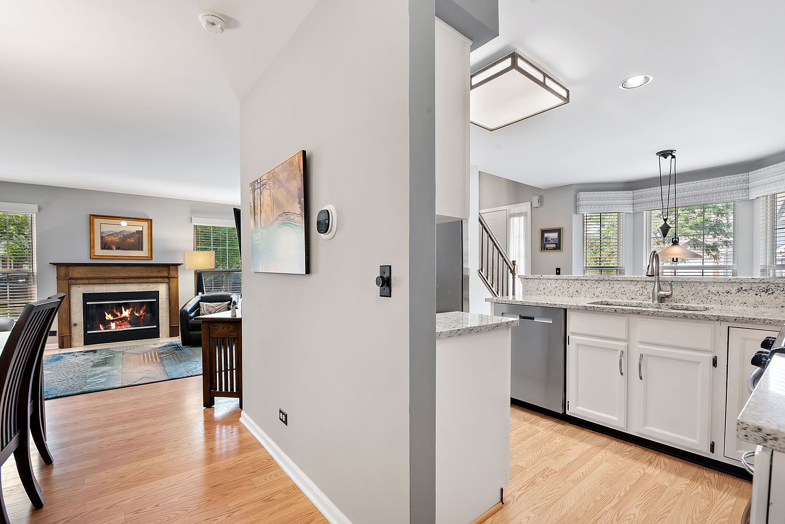 1061 Stillwater Road Elgin, IL 60120 - Photo 8 of 20 a kitchen with stainless steel appliances granite countertop a refrigerator and stove