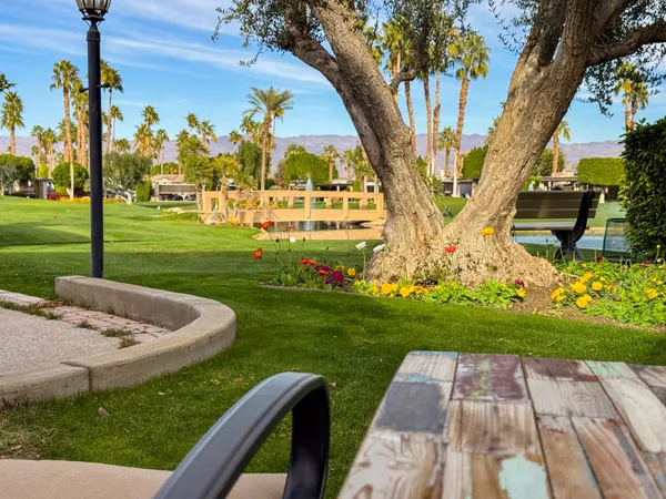a living room with a couch and a table