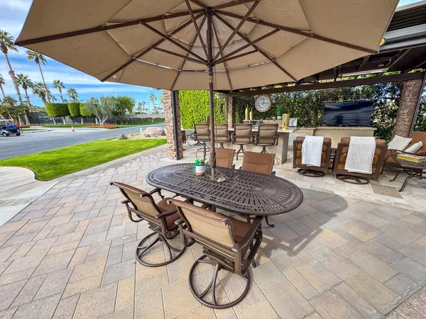 a view of outdoor space with chairs