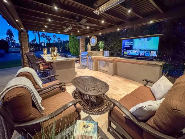 a view of a chairs and tables in the patio
