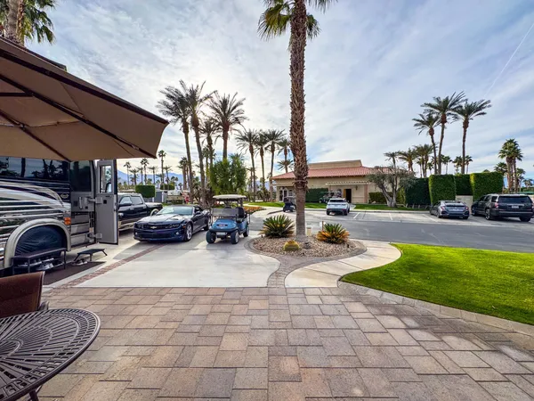 a view of street with sitting area