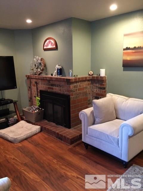 1800 Severn Drive Reno, NV 89503 - Photo 2 of 21 a living room with furniture and a fireplace
