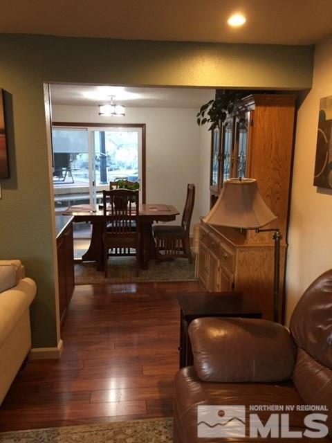 1800 Severn Drive Reno, NV 89503 - Photo 3 of 21 a living room with furniture and a floor to ceiling window