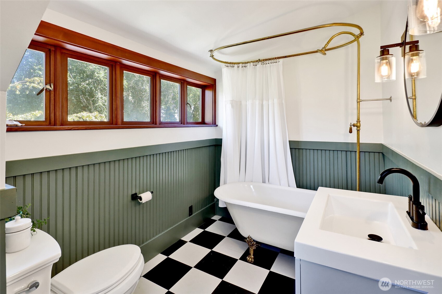 4749 Chuckanut Mountain Drive Bow, WA 98232 - Photo 16 of 40 a bathroom with a sink a toilet a mirror and shower