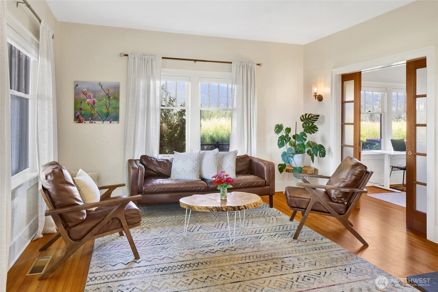 4749 Chuckanut Mountain Drive Bow, WA 98232 - Photo 17 of 40 a living room with furniture and wooden floor