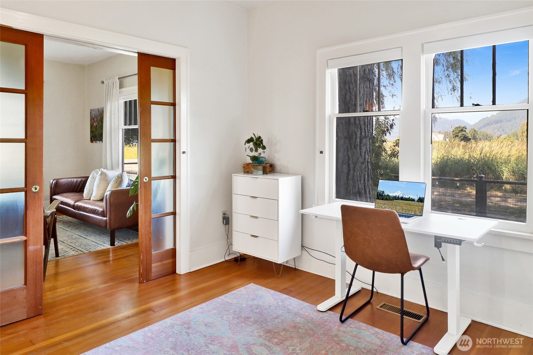 4749 Chuckanut Mountain Drive Bow, WA 98232 - Photo 19 of 40 a living room with furniture and a window