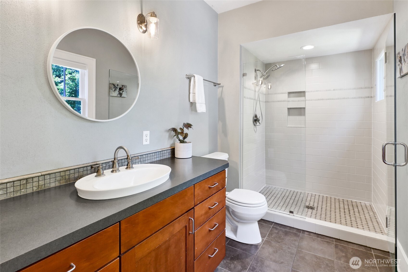 4749 Chuckanut Mountain Drive Bow, WA 98232 - Photo 20 of 40 a bathroom with a sink a toilet and a mirror