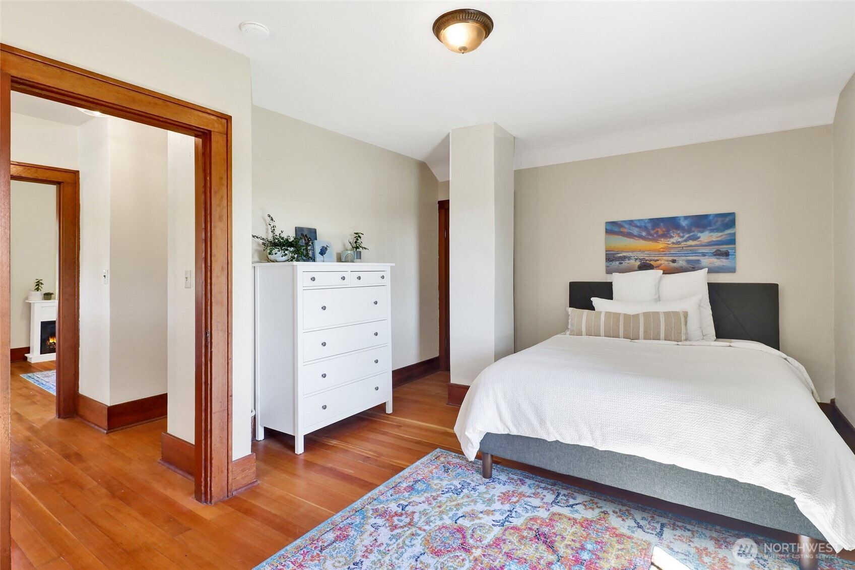 4749 Chuckanut Mountain Drive Bow, WA 98232 - Photo 32 of 40 a spacious bedroom with a bed and a dresser