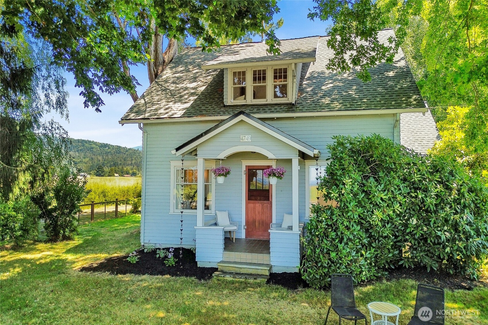4749 Chuckanut Mountain Drive Bow, WA 98232 - Photo 38 of 40 a front view of a house with a yard