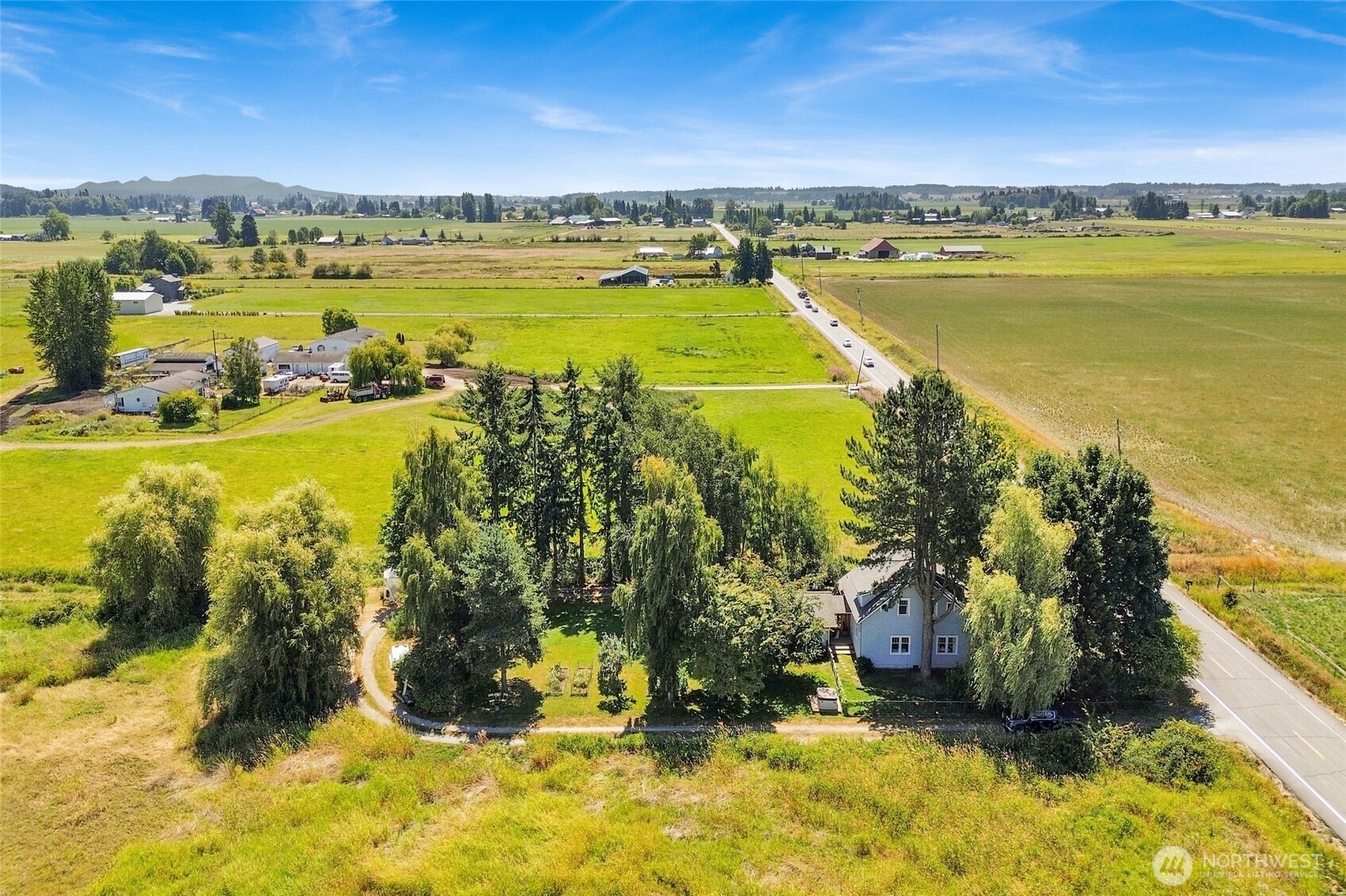 4749 Chuckanut Mountain Drive Bow, WA 98232 - Photo 39 of 40 a view of a lake with a city