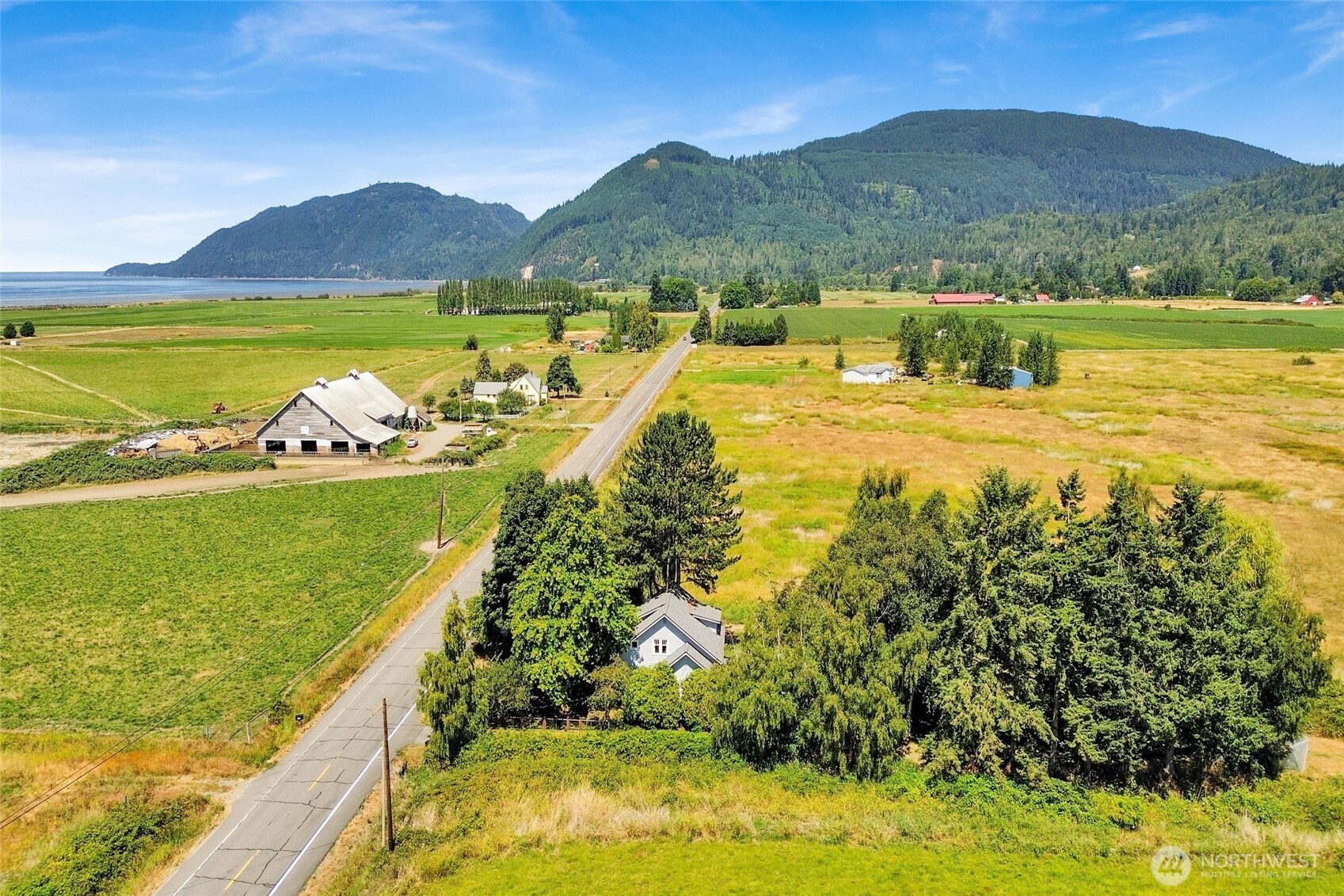4749 Chuckanut Mountain Drive Bow, WA 98232 - Photo 10 of 40 a view of an ocean and a mountain