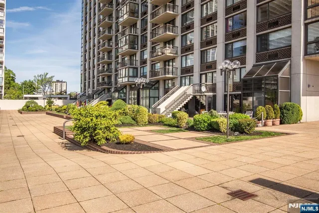 a view of a building with a street