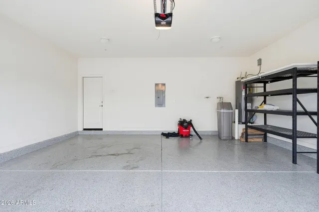 a front view of a house with a large window