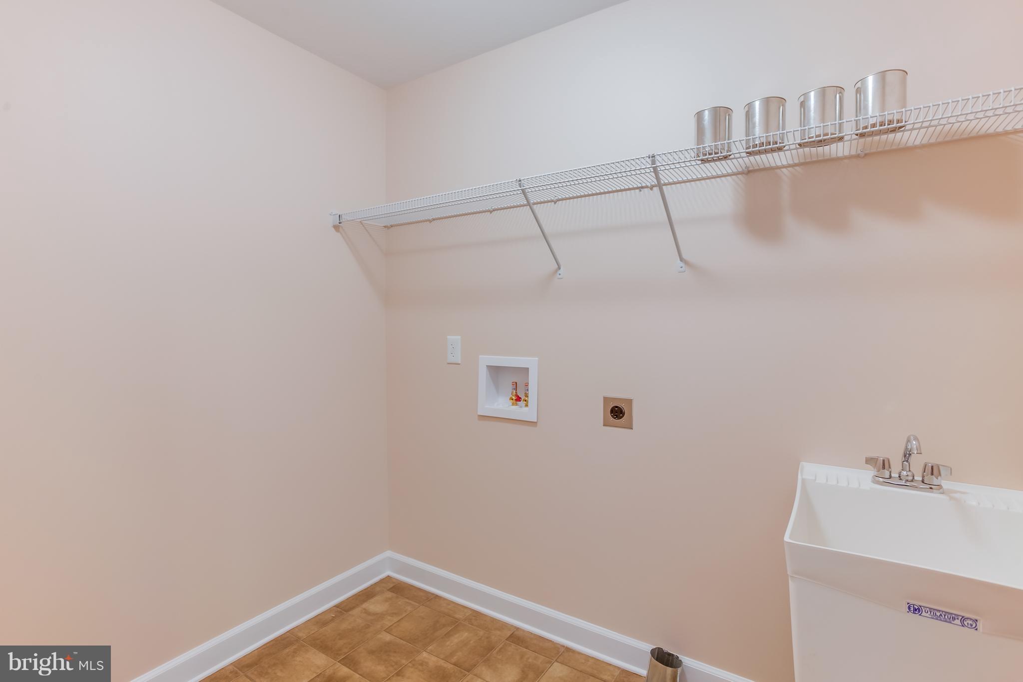 7th Street King George, VA 22485 - Photo 10 of 30 Separate Laundry Room w/ washer/dryer hook-up