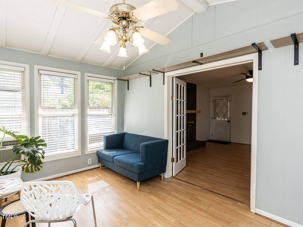 1317 Kelly Road Garner, NC 27529 - Photo 14 of 31 a living room with furniture and a large window