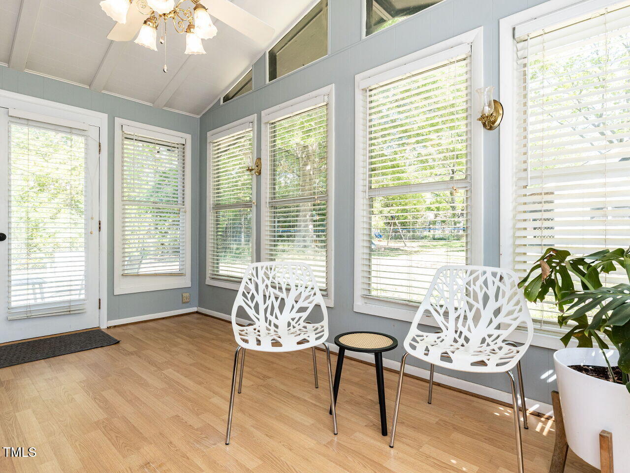 1317 Kelly Road Garner, NC 27529 - Photo 15 of 31 a living room with furniture and a large window
