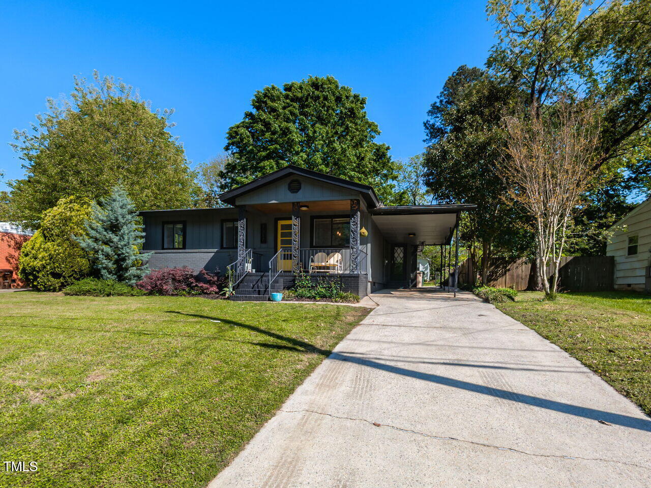 1317 Kelly Road Garner, NC 27529 - Photo 2 of 31 a view of a house with backyard and garden