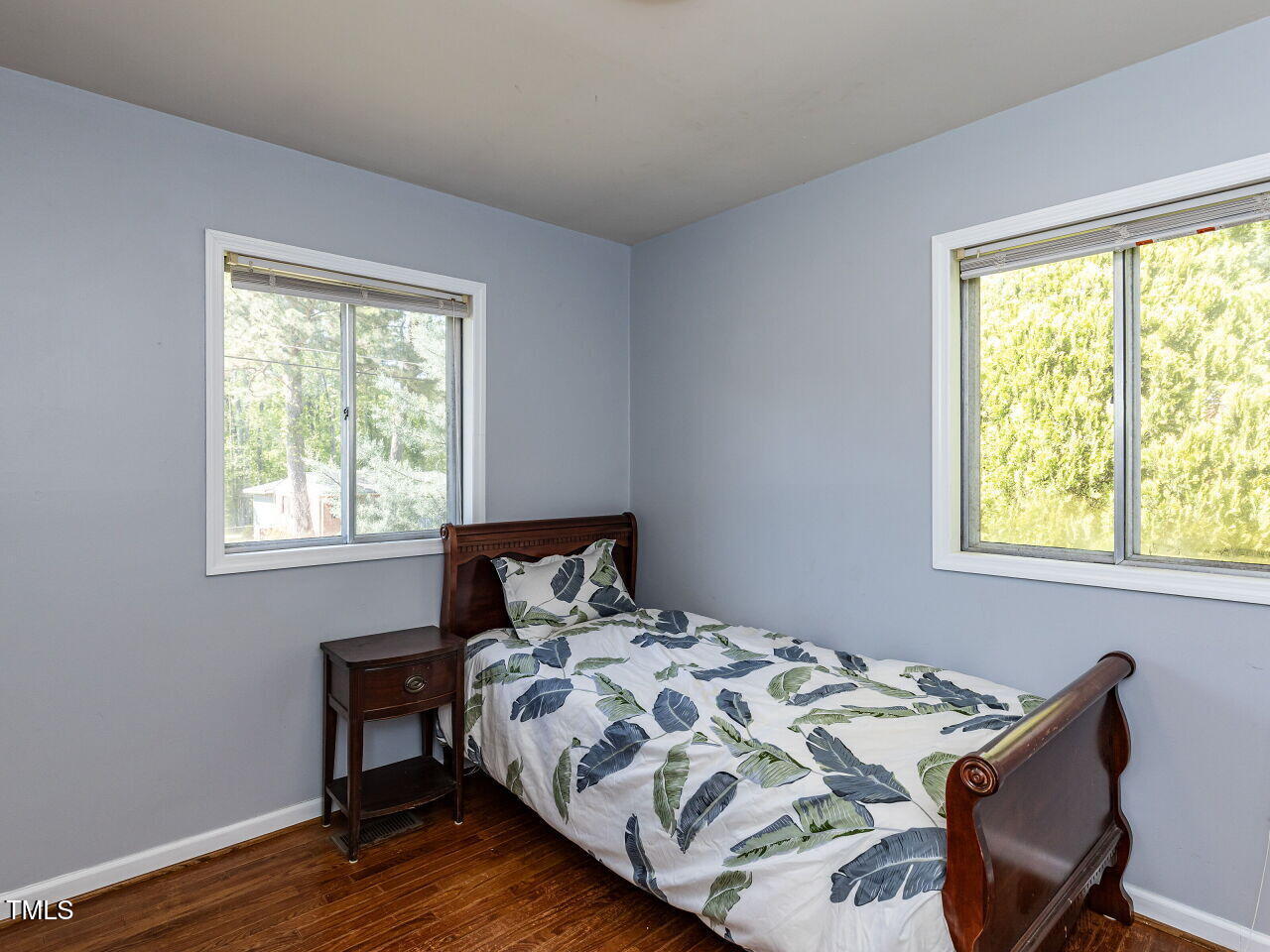 1317 Kelly Road Garner, NC 27529 - Photo 22 of 31 a bedroom with a bed and a window