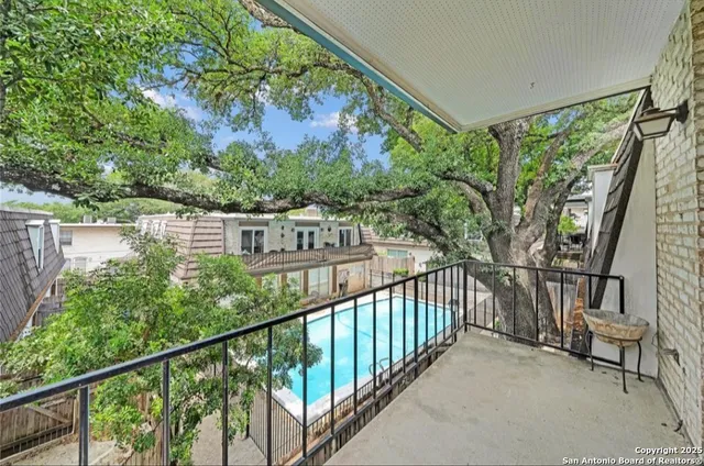 a view of a building from a balcony