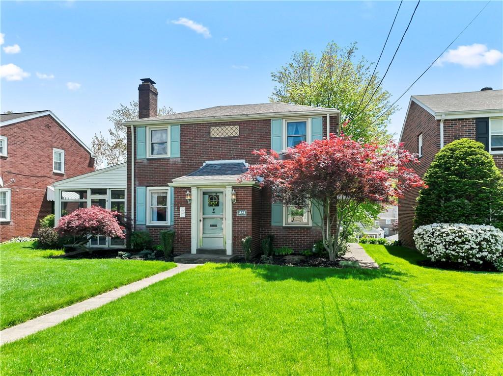 1543 2nd Street Beaver, PA 15009 - Photo 14 of 14 a front view of a house with a garden