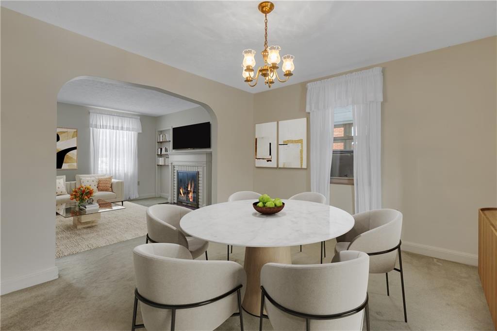 1543 2nd Street Beaver, PA 15009 - Photo 7 of 14 a view of a dining room with furniture and a chandelier