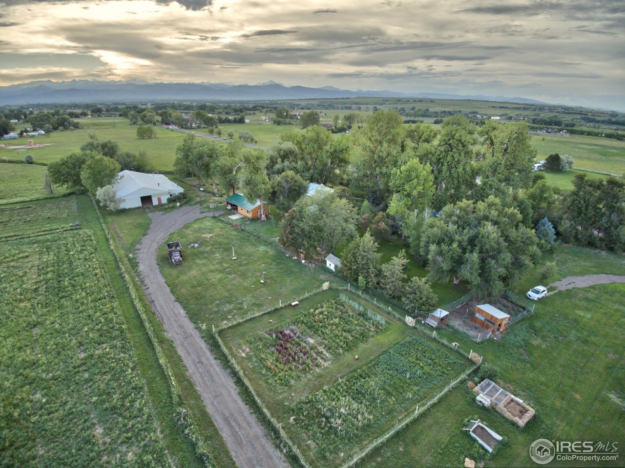 9760 Isabelle Road Lafayette, CO 80026 - Photo 2 of 40 a view of a lush green hillside
