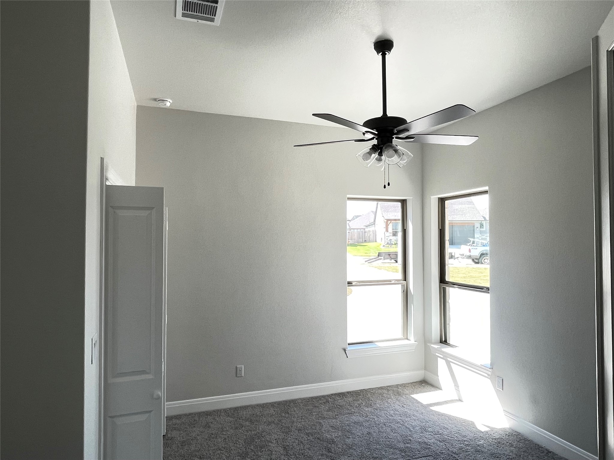 104 Creek Point Drive Georgetown, TX 78628 - Photo 5 of 18 a room with a window and a ceiling fan