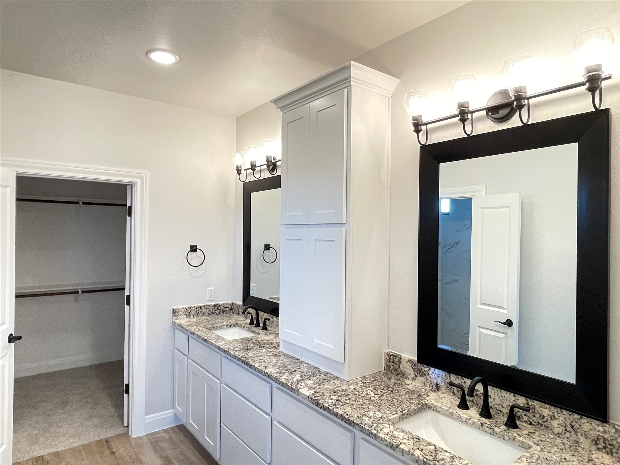 104 Creek Point Drive Georgetown, TX 78628 - Photo 8 of 18 a bathroom with a granite countertop sink and a mirror