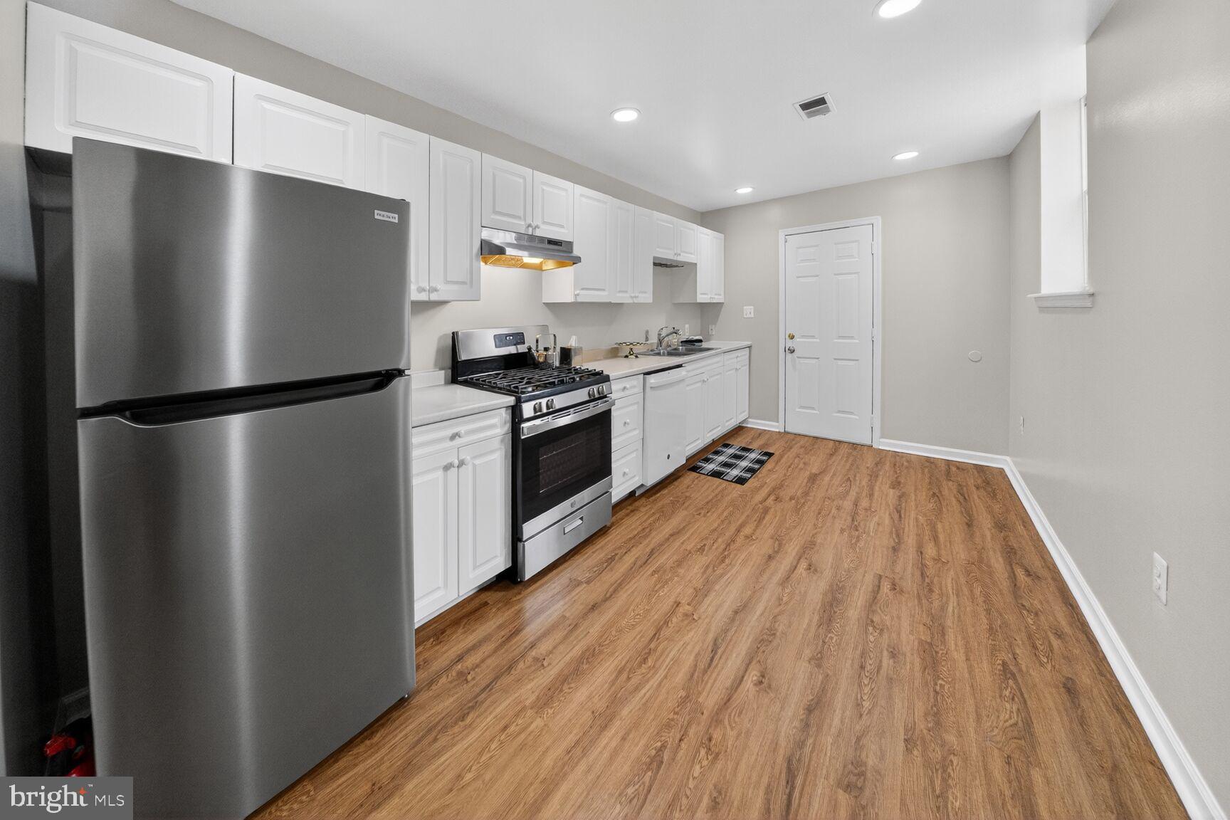 46 Florida Avenue Northwest Washington, DC 20001 - Photo 10 of 40 Modern kitchen with sleek appliances.