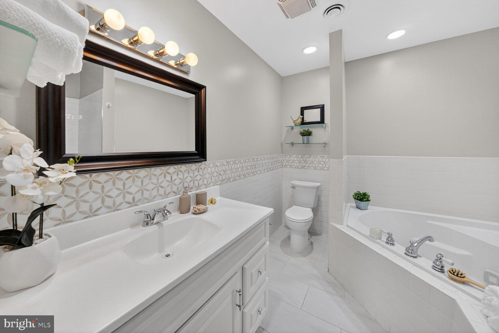 46 Florida Avenue Northwest Washington, DC 20001 - Photo 20 of 40 Primary bathroom with modern finishes.