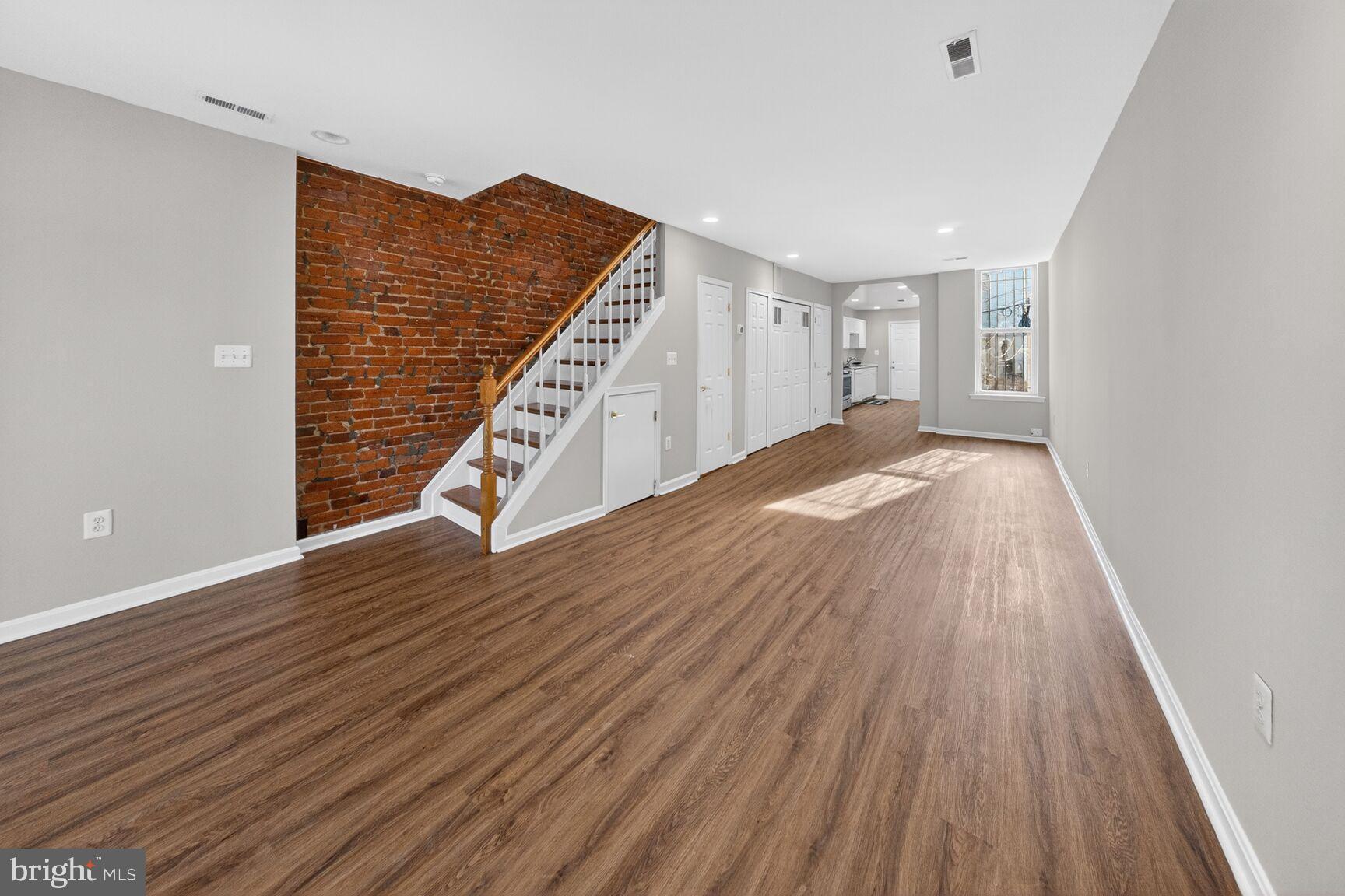 46 Florida Avenue Northwest Washington, DC 20001 - Photo 4 of 40 Spacious living area with rustic charm.