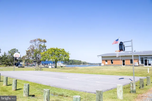 a view of a swimming pool with an outdoor space and seating area