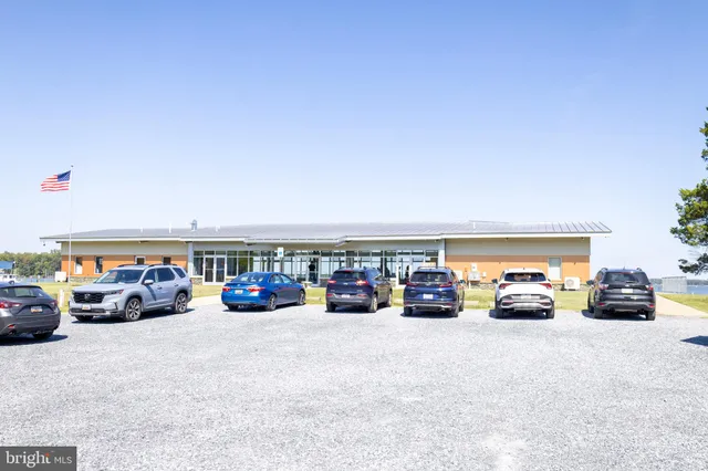 a view of car parked in front of garage