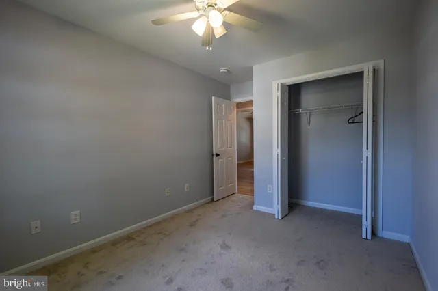 an empty room with a bathroom