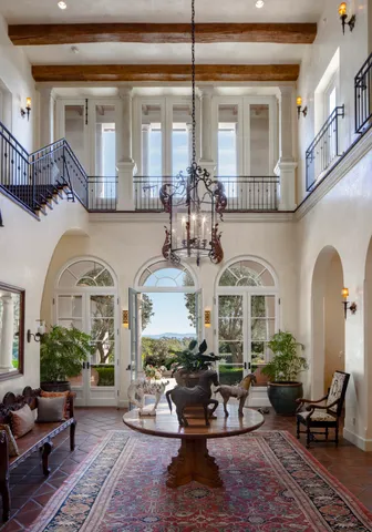 a view of living room filled with furniture